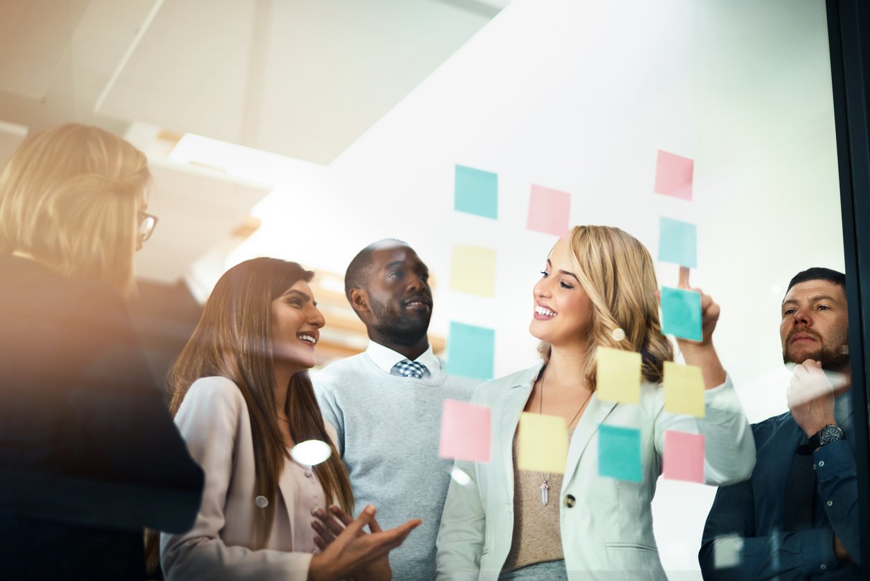 group of marketers discussing insurance marketing trends